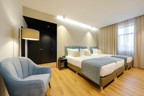 Triple Room | 1 bedroom, minibar, in-room safe, desk