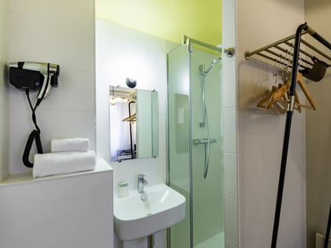 Small single room | Bathroom | Hair dryer, towels