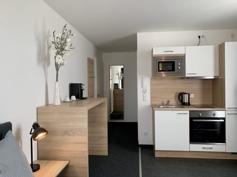 Studio-Apartment (2 Adults) | Private kitchen | Fridge, microwave, oven, stovetop