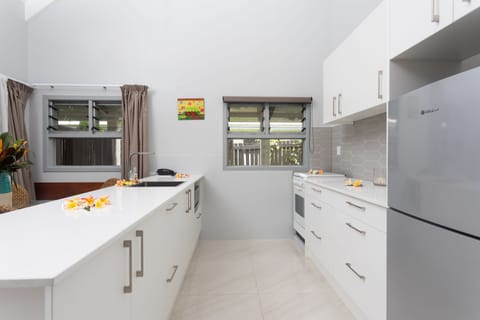 Villa, 1 King Bed, Garden Area | Private kitchen | Full-size fridge, microwave, stovetop, coffee/tea maker