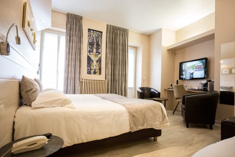 Deluxe Room, Multiple Beds, Non Smoking | In-room safe, individually decorated, individually furnished, desk