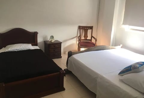 Triple Room, Multiple Beds | Iron/ironing board, free WiFi, bed sheets