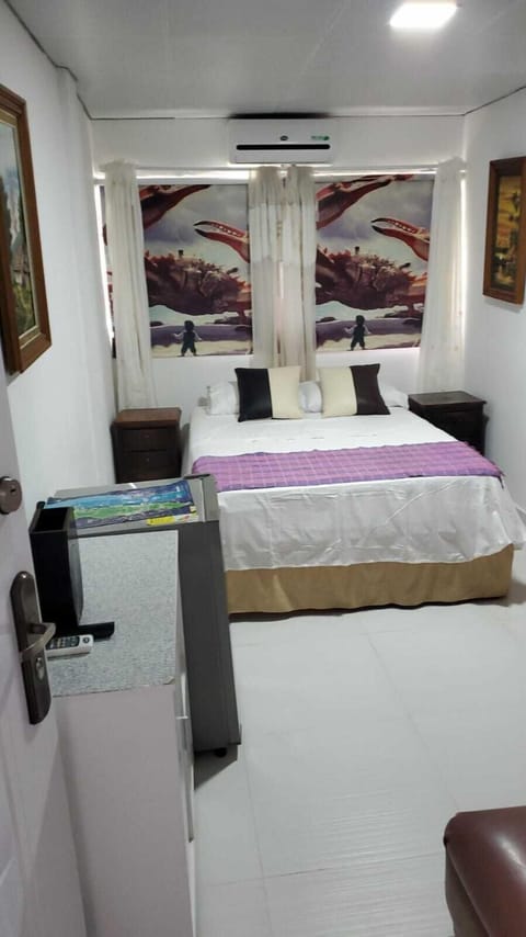 Triple Room, Multiple Beds | Iron/ironing board, free WiFi, bed sheets