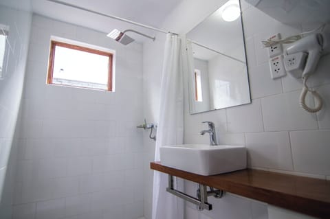 Shower, designer toiletries, hair dryer, heated floors