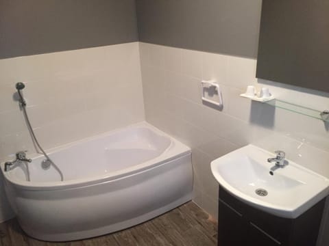 Rainfall showerhead, towels, soap, shampoo