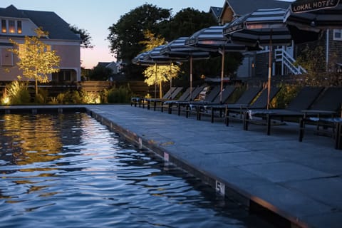 Seasonal outdoor pool, pool umbrellas, sun loungers