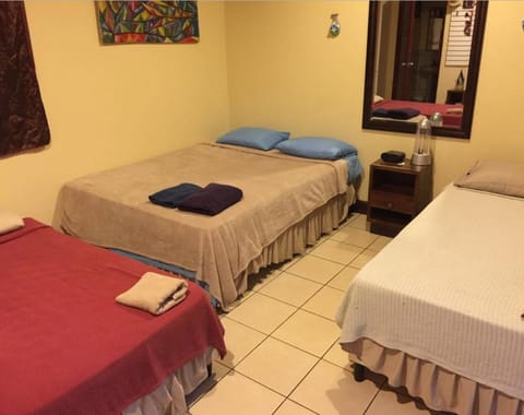 Traditional Triple Room, 1 Bedroom | Individually decorated, desk, iron/ironing board, free WiFi