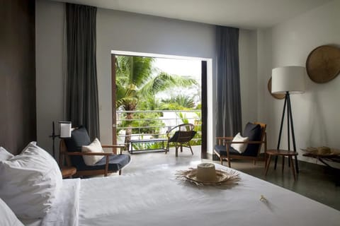 Suite, 1 King Bed, Sea View | Premium bedding, minibar, in-room safe, individually decorated