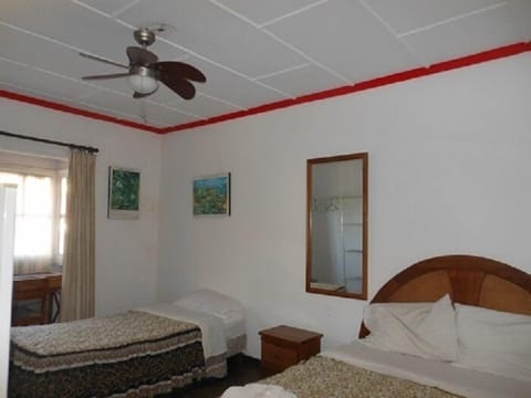 Family Room, City View | Iron/ironing board, free WiFi, bed sheets