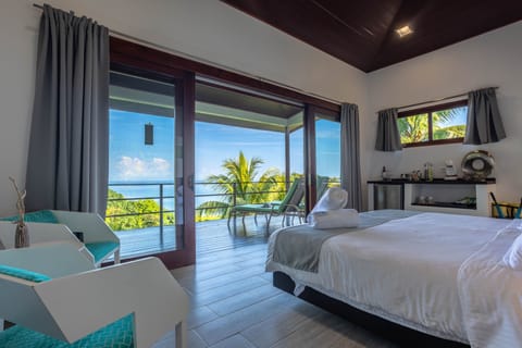 Panoramic Villa, Multiple Beds, Ocean View | Minibar, in-room safe, desk, laptop workspace