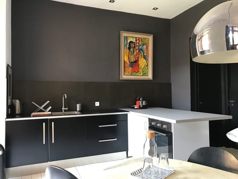 Deluxe Loft, Garden View | Living area | Flat-screen TV