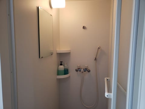 Quadruple Room, Men only | Bathroom | Shower, hair dryer, slippers, towels