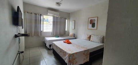 Basic Triple Room | Minibar, blackout drapes, free WiFi, bed sheets