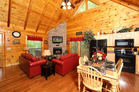 Cabin, Multiple Beds, Hot Tub | Living area | 35-inch flat-screen TV with cable channels, TV, fireplace