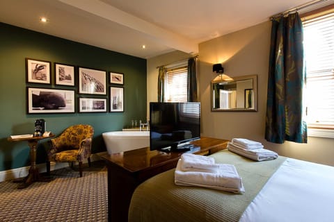 Deluxe Double Room | Select Comfort beds, desk, laptop workspace, iron/ironing board