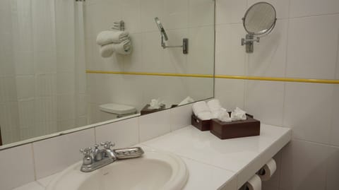 Rainfall showerhead, designer toiletries, hair dryer, heated floors