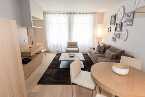 Apartment, 1 Bedroom | Living area | Flat-screen TV