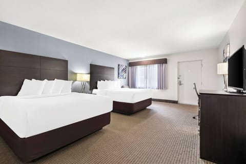 Suite, 2 Queen Beds, Non Smoking (with Sofabed) | Premium bedding, down comforters, pillowtop beds, individually decorated