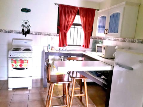 Standard Room | Private kitchen | Full-size fridge, microwave, stovetop, cookware/dishes/utensils