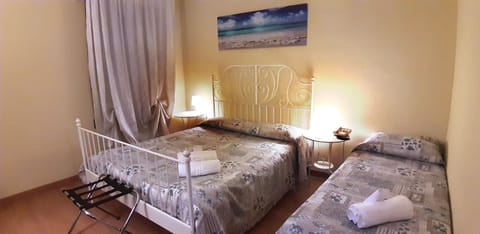 Triple Room | Minibar, in-room safe, desk, soundproofing