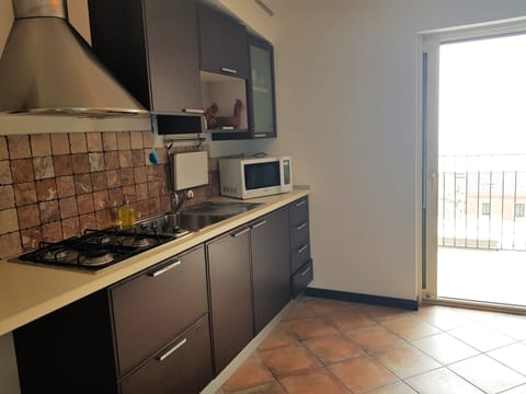 City Apartment, Partial Sea View (Eracle) | Private kitchen | Fridge, microwave, stovetop, cookware/dishes/utensils