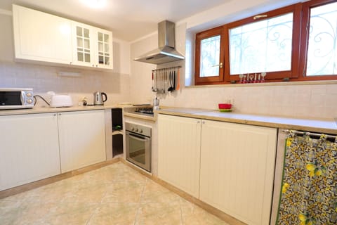 Superior Apartment, 3 Bedrooms | Private kitchen | Full-size fridge, microwave, oven, stovetop