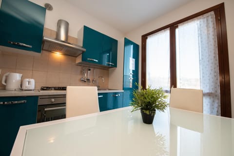 Apartment, 2 Bedrooms (App. 13) | Private kitchen | Full-size fridge, oven, stovetop, coffee/tea maker