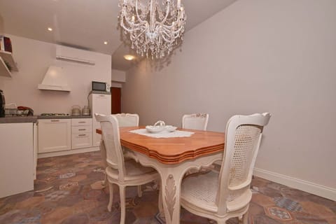 Basic Apartment, 1 Bedroom | Living area | Flat-screen TV