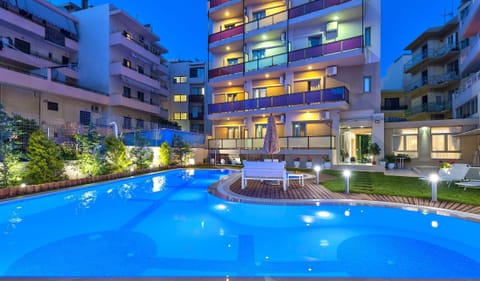 Seasonal outdoor pool, pool umbrellas, sun loungers