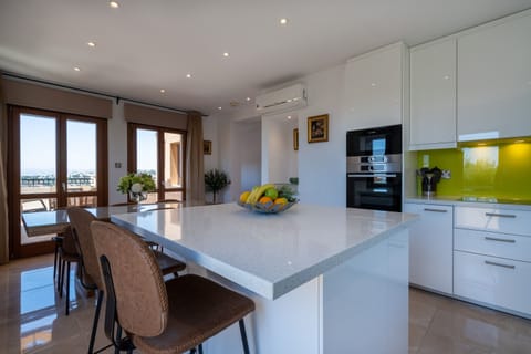 Villa | Private kitchen | Full-size fridge, microwave, oven, stovetop