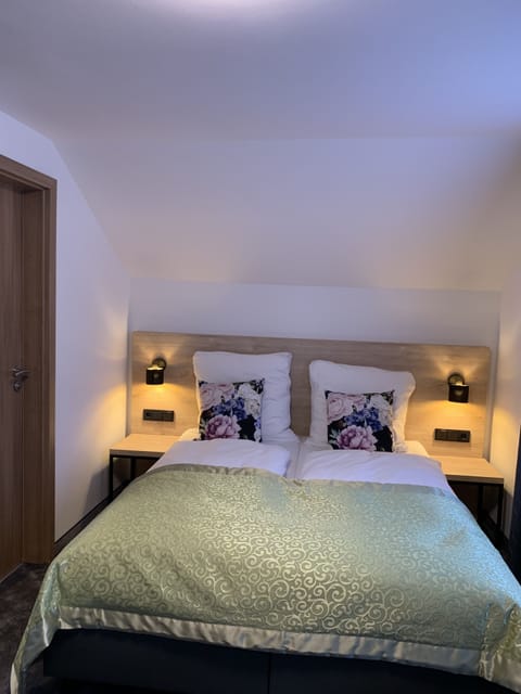 Double or Twin Room | Down comforters, desk, laptop workspace, blackout drapes