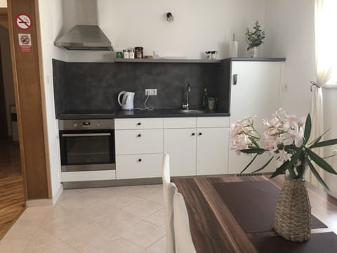 Comfort Apartment | Private kitchen | Fridge, microwave, freezer