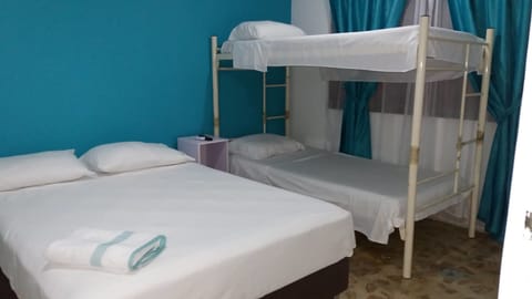 Quadruple Room, Non Smoking | Iron/ironing board, free WiFi, bed sheets