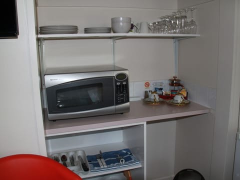 Premium One Bedroom Apartment | Private kitchenette | Fridge, microwave, electric kettle