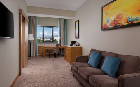 Suite, 1 Bedroom | Living area | 42-inch LCD TV with cable channels, TV