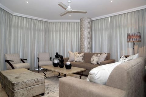 Luxury Apartment, 3 Bedrooms | Living area | Flat-screen TV