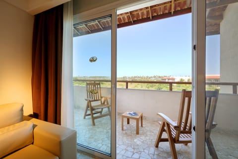 Junior Suite, Poolside | Balcony view