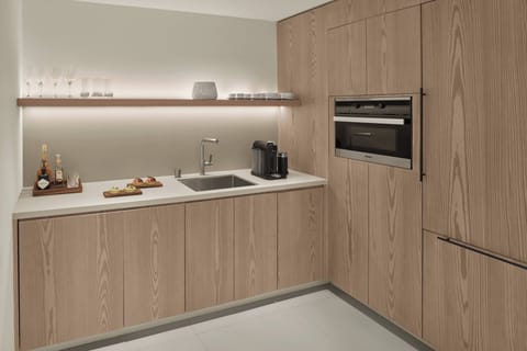 Suite, 1 King Bed with Sofa bed, Balcony | Private kitchen | Coffee/tea maker