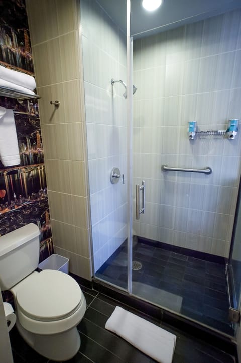 Shower, rainfall showerhead, designer toiletries, hair dryer