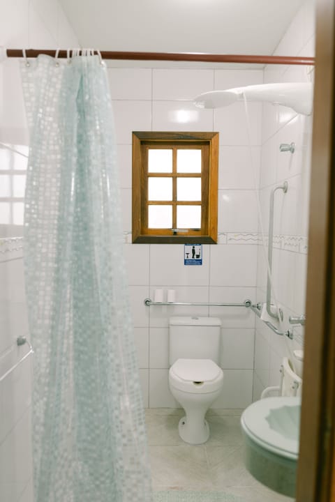 Basic Triple Room, Accessible | Bathroom | Shower, free toiletries, hair dryer, towels