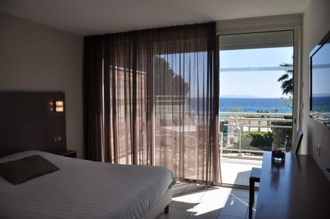 Room, Multiple Beds, Terrace, Sea View | In-room safe, individually decorated, individually furnished, desk