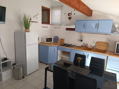 Apartment | Private kitchen | Fridge, microwave, stovetop, coffee/tea maker