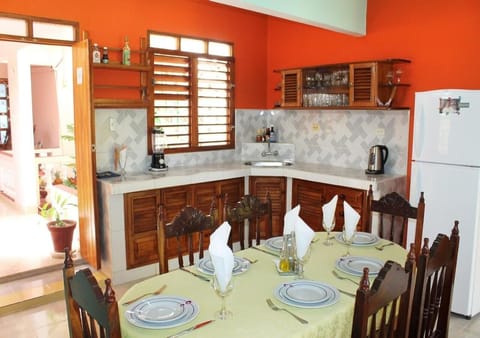 Family Double Room | Private kitchen | Microwave, dishwasher, cleaning supplies, dining tables