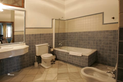 Double or Twin Room | Bathroom | Combined shower/tub, free toiletries, hair dryer