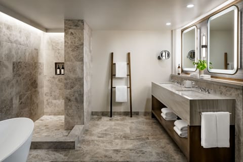 Separate tub and shower, deep soaking tub, designer toiletries