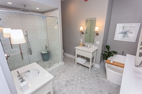 Magnolia Suite | Bathroom | Designer toiletries, hair dryer, bathrobes, towels