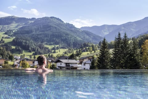Outdoor pool, open 7:30 AM to 10:00 PM, sun loungers