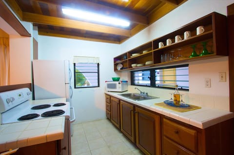 Suite, 2 Bedrooms | Private kitchen | Fridge, coffee/tea maker