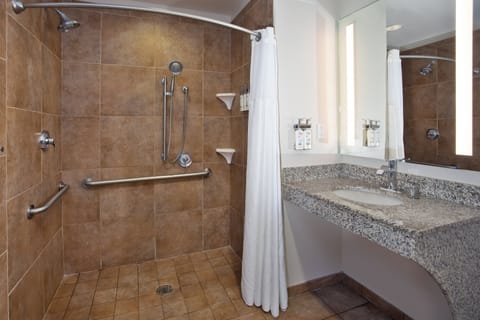 Room, 1 King Bed, Accessible (Communications, Mobil, Roll-In Shower) | Bathroom | Combined shower/tub, free toiletries, hair dryer, towels