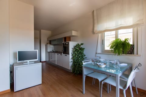 Apartment, 1 Bedroom (max 4 people) | Private kitchen | Full-size fridge, microwave, stovetop, dishwasher